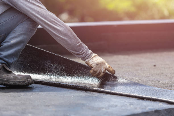Professional Waterproofing technician working in Crum Lynne, PA